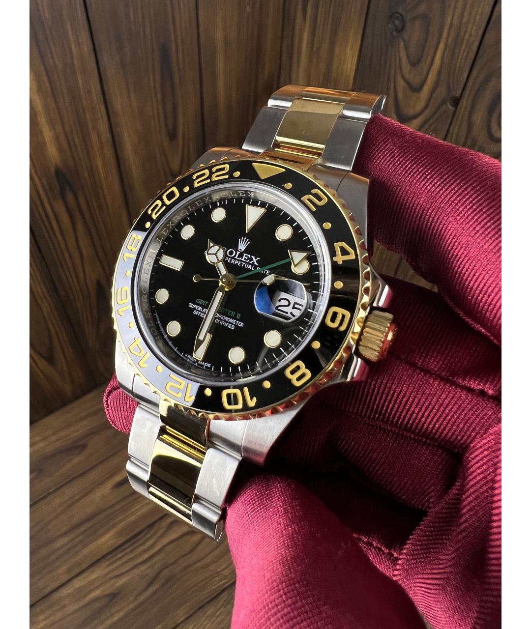 ROLEX Черные часы из желтого золота, фото 2