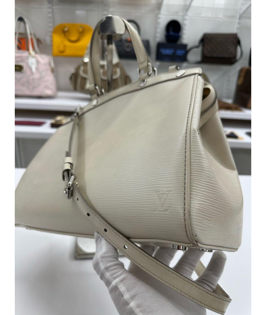 LOUIS VUITTON Кожаная сумка с короткими ручками, фото 3
