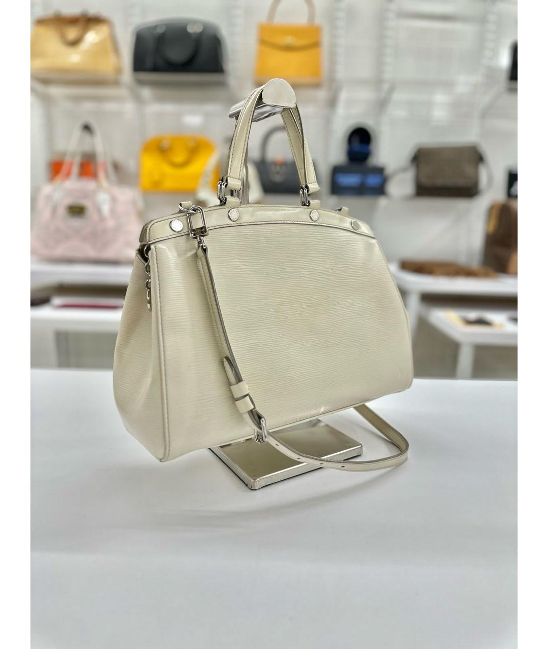LOUIS VUITTON Кожаная сумка с короткими ручками, фото 2