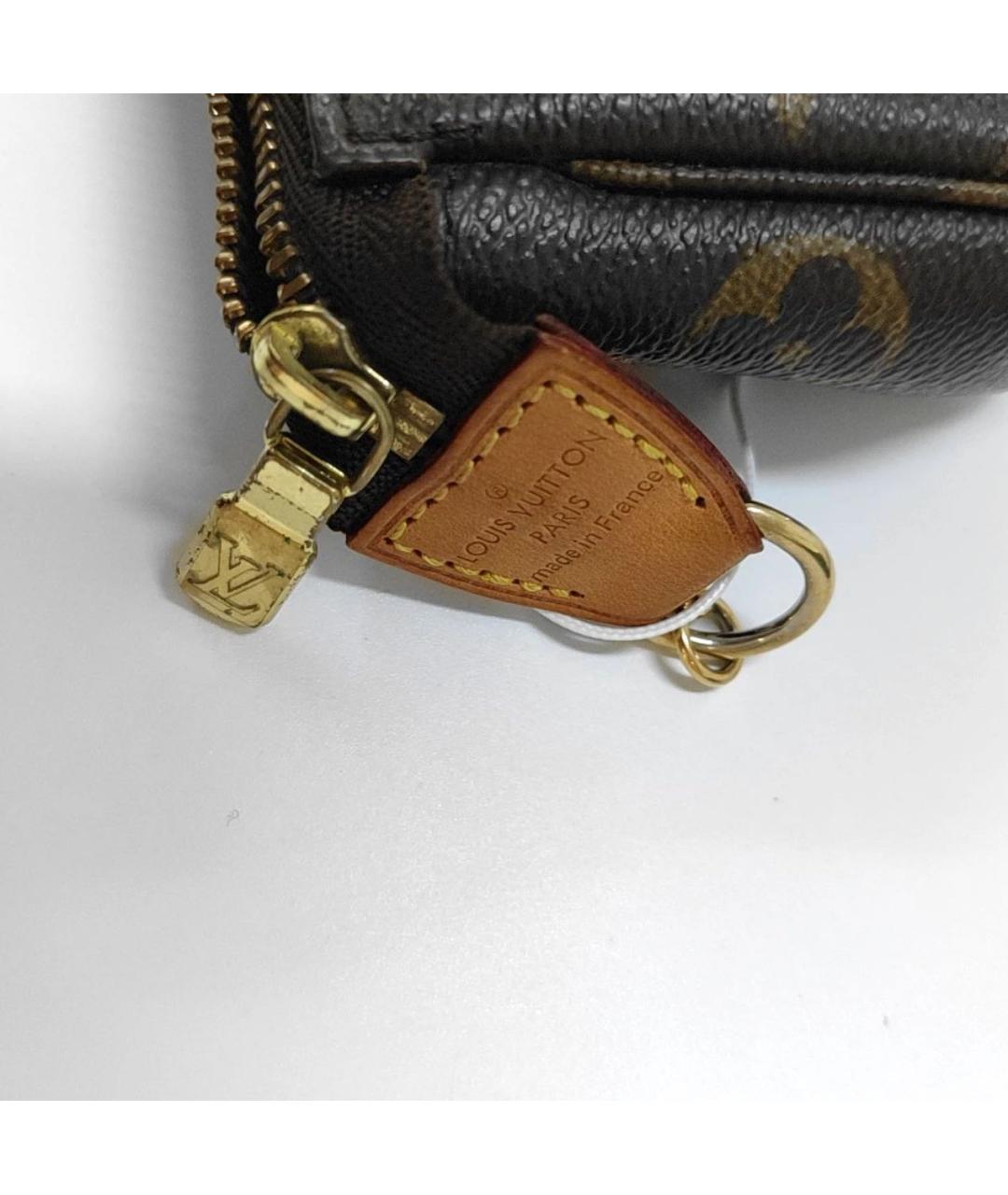 LOUIS VUITTON Коричневая кожаная сумка с короткими ручками, фото 6