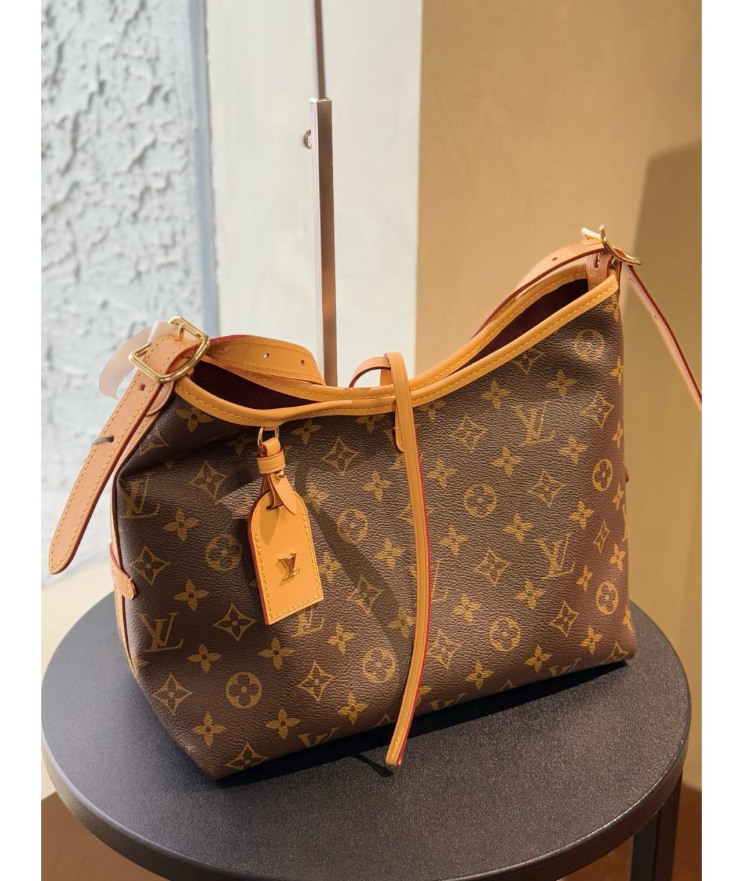 LOUIS VUITTON Коричневая кожаная сумка тоут, фото 4