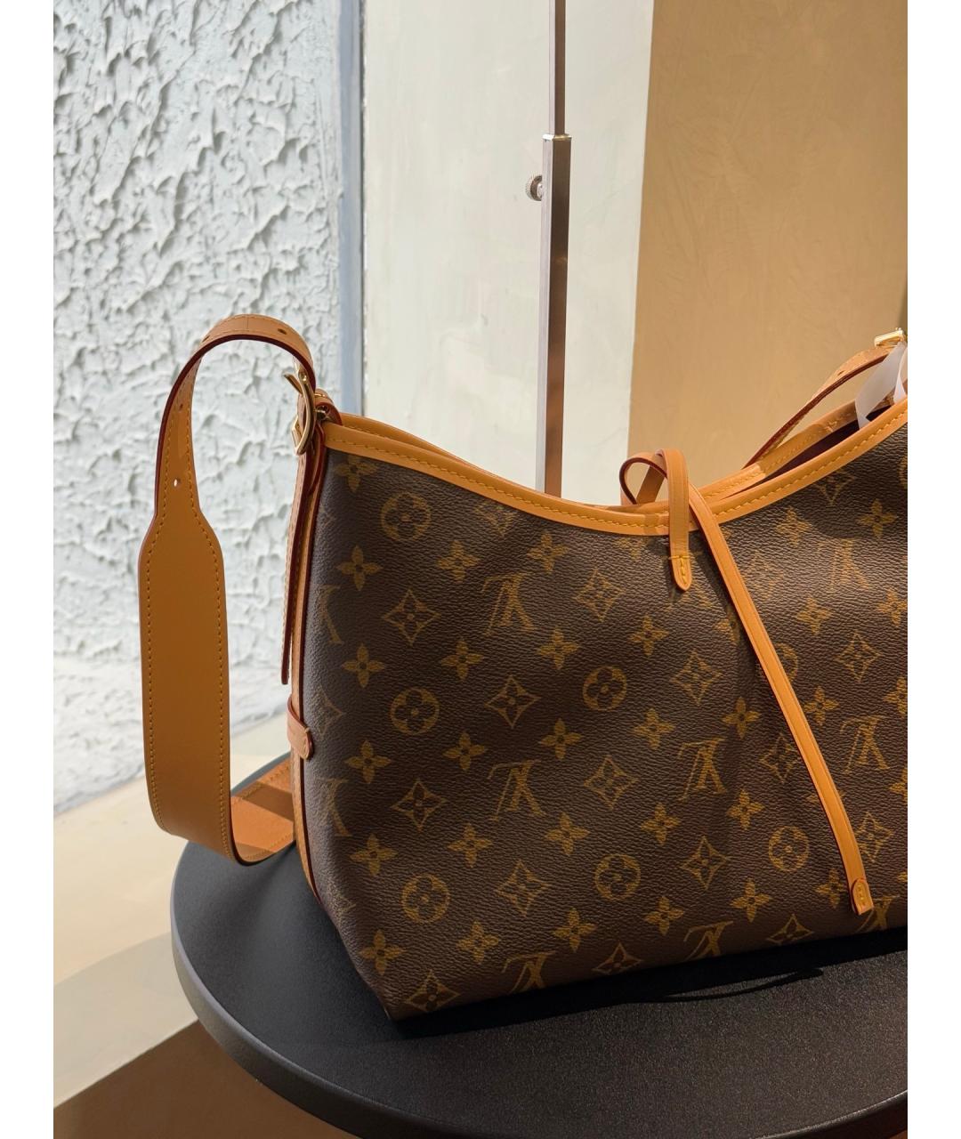 LOUIS VUITTON Коричневая кожаная сумка тоут, фото 7