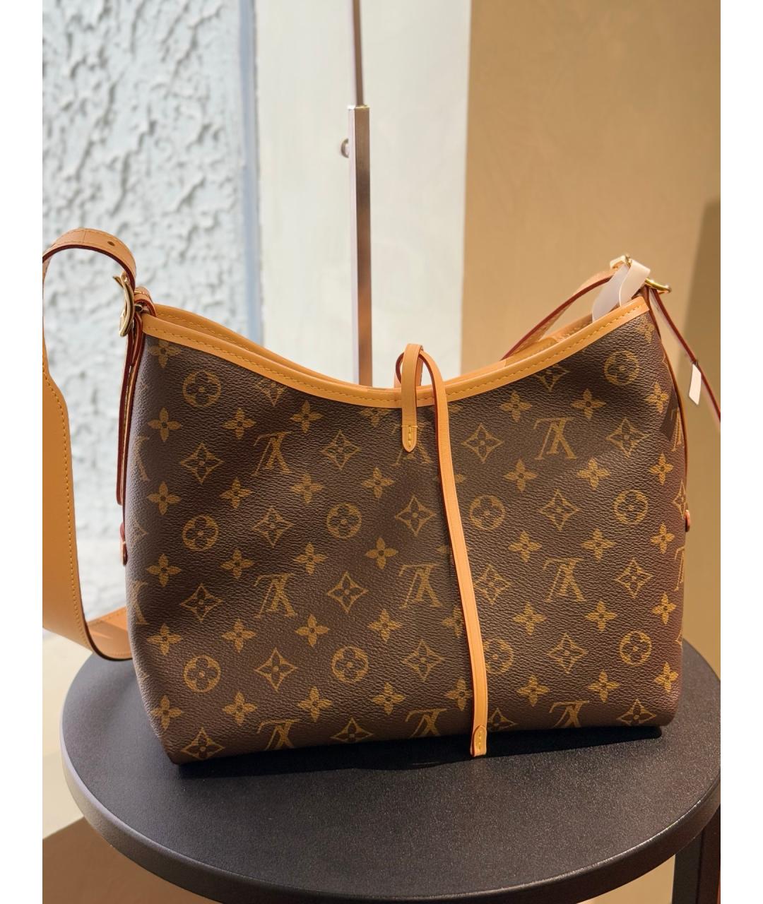 LOUIS VUITTON Коричневая кожаная сумка тоут, фото 6