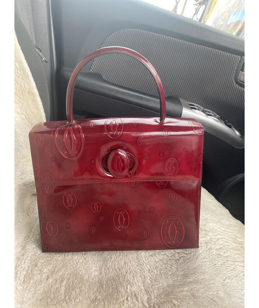 CARTIER Бордовая сумка с короткими ручками из лакированной кожи, фото 9