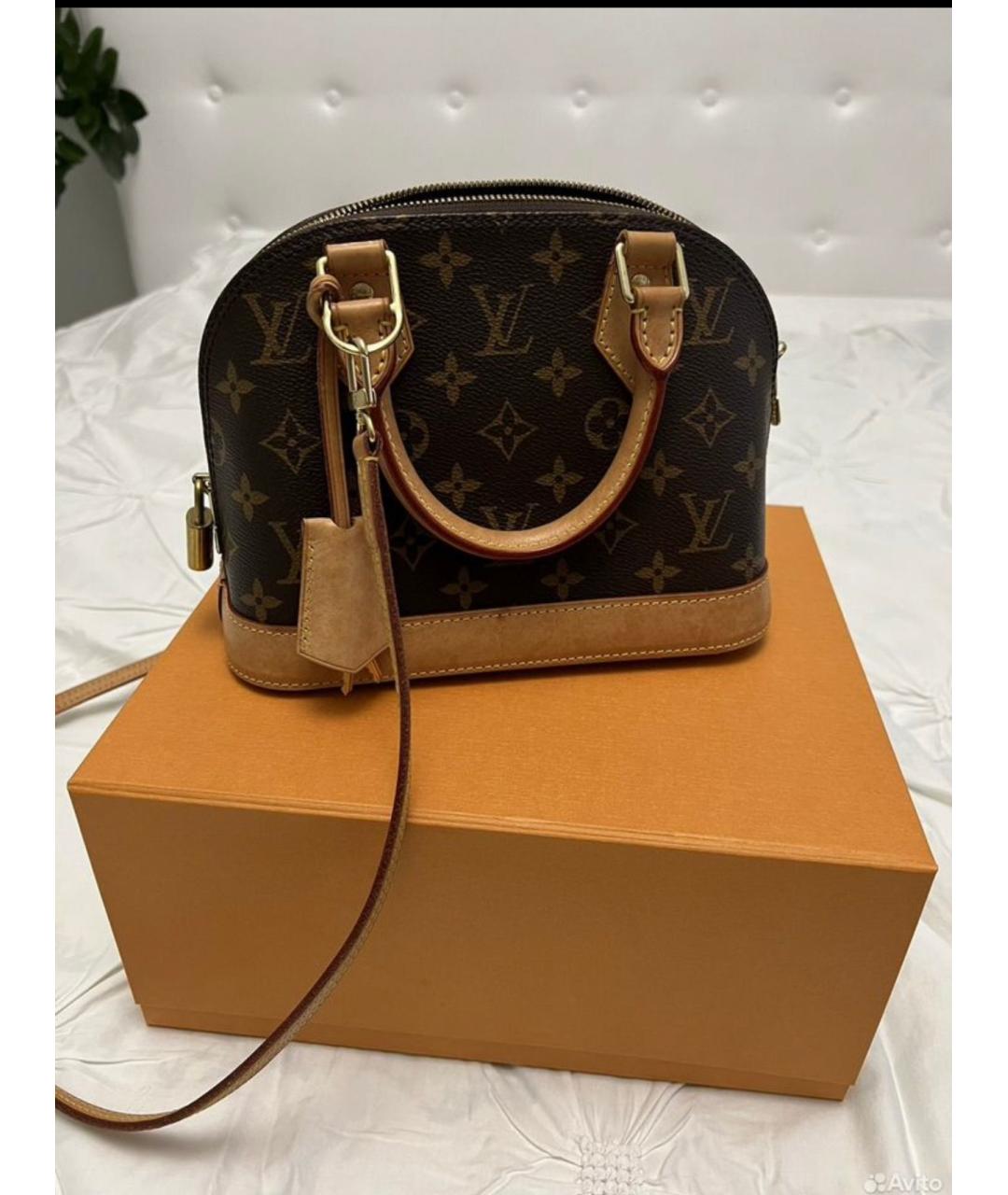 LOUIS VUITTON Коричневая кожаная сумка с короткими ручками, фото 3