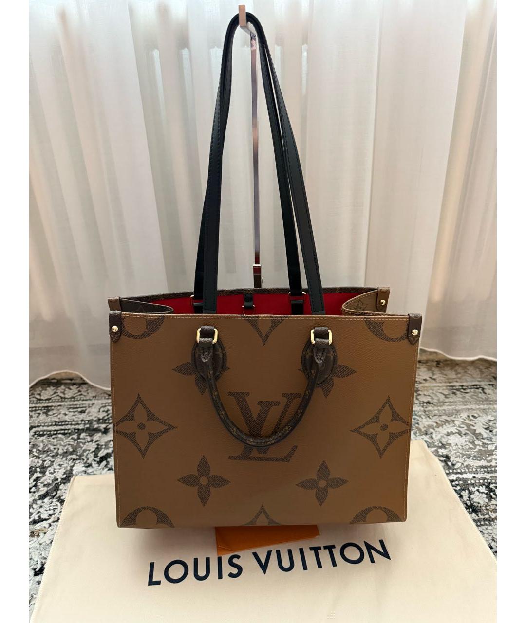 LOUIS VUITTON Коричневая кожаная сумка с короткими ручками, фото 3