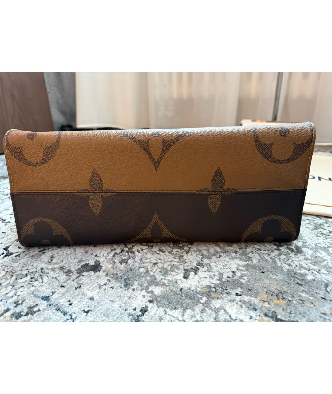 LOUIS VUITTON Коричневая кожаная сумка с короткими ручками, фото 5