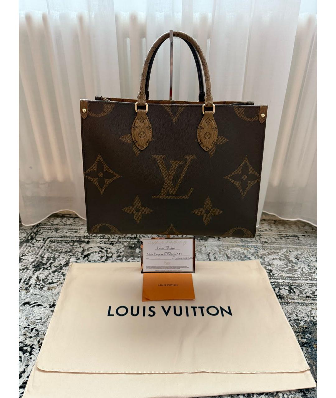 LOUIS VUITTON Коричневая кожаная сумка с короткими ручками, фото 9
