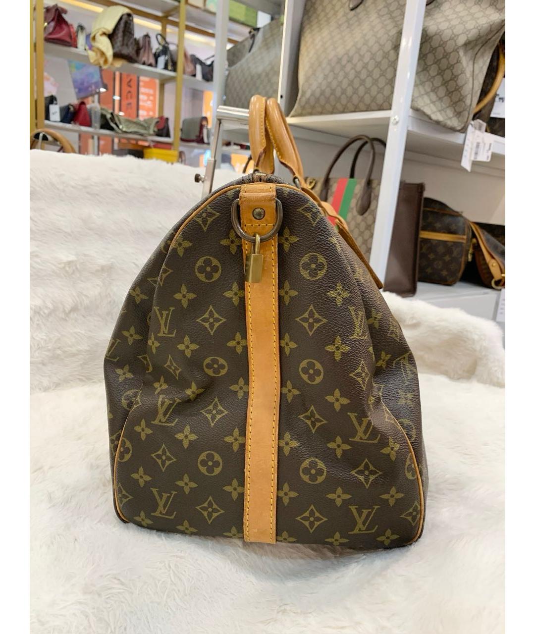 LOUIS VUITTON Коричневая кожаная дорожная/спортивная сумка, фото 8