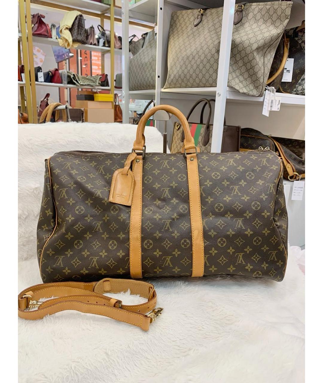 LOUIS VUITTON Коричневая кожаная дорожная/спортивная сумка, фото 2