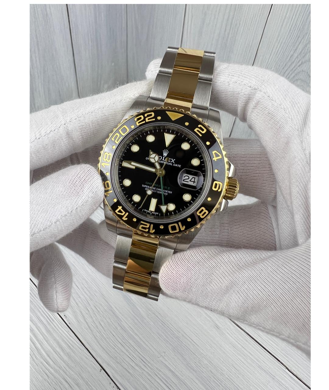 ROLEX Черные часы из желтого золота, фото 2