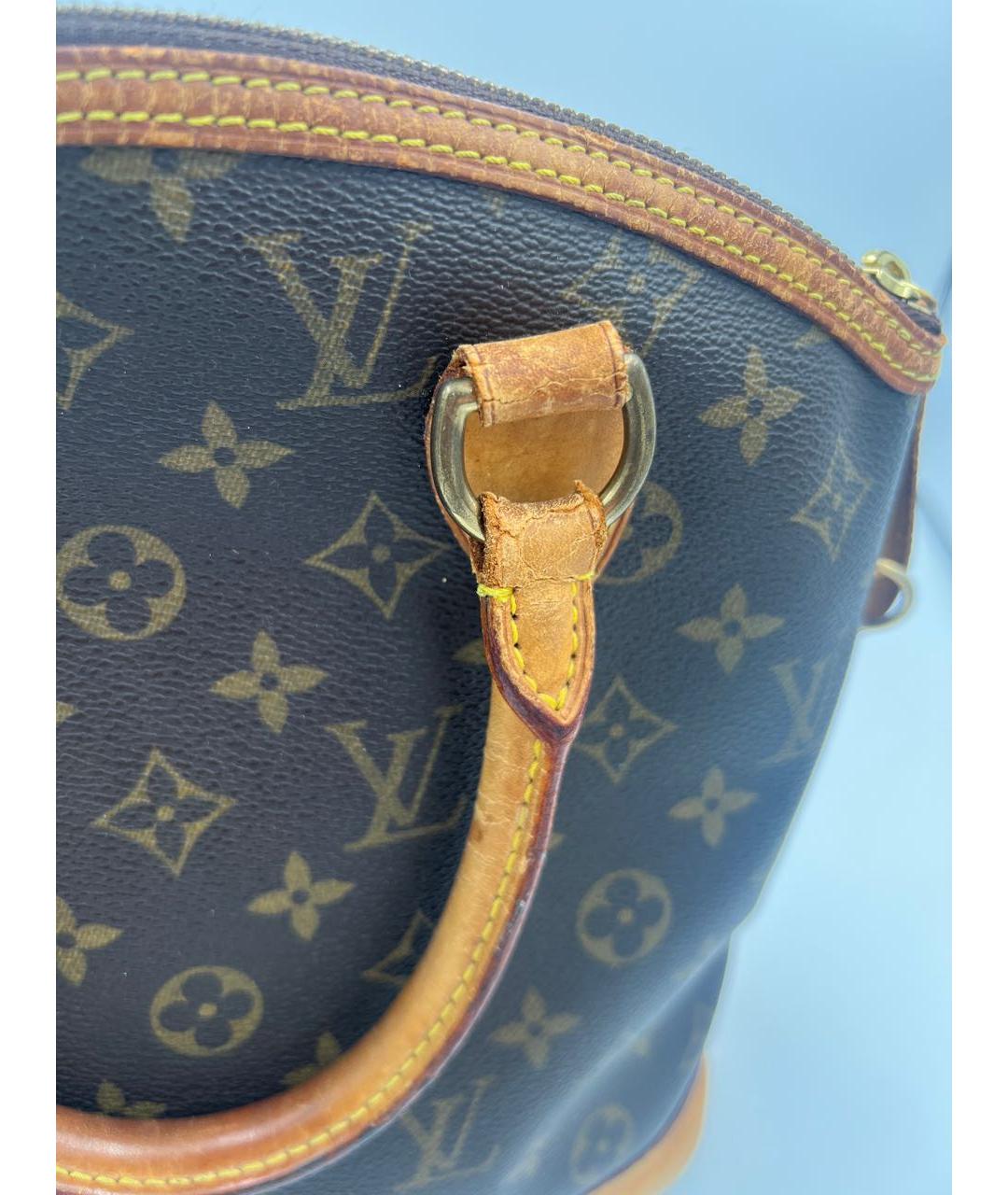 LOUIS VUITTON Коричневая кожаная сумка с короткими ручками, фото 3