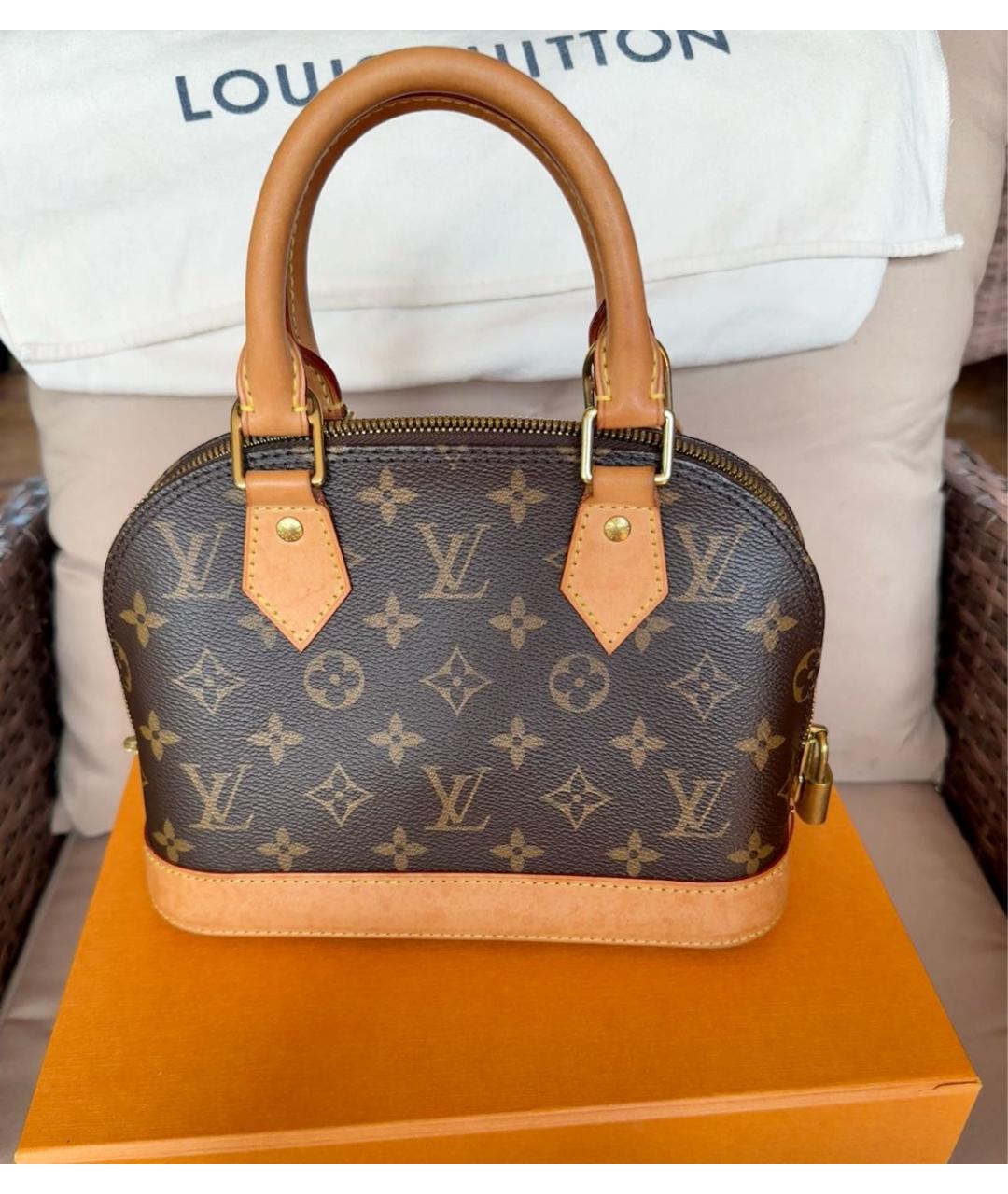 LOUIS VUITTON Коричневая кожаная сумка с короткими ручками, фото 3