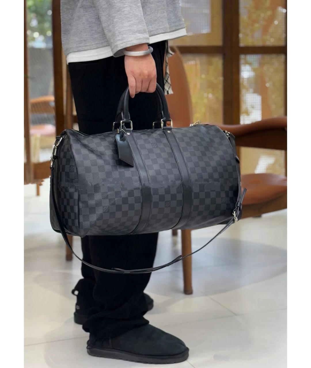 LOUIS VUITTON Черная дорожная/спортивная сумка из искусственной кожи, фото 7
