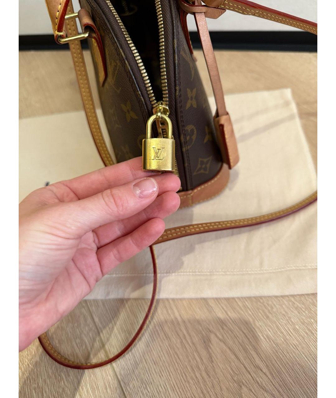 LOUIS VUITTON Коричневая кожаная сумка с короткими ручками, фото 7