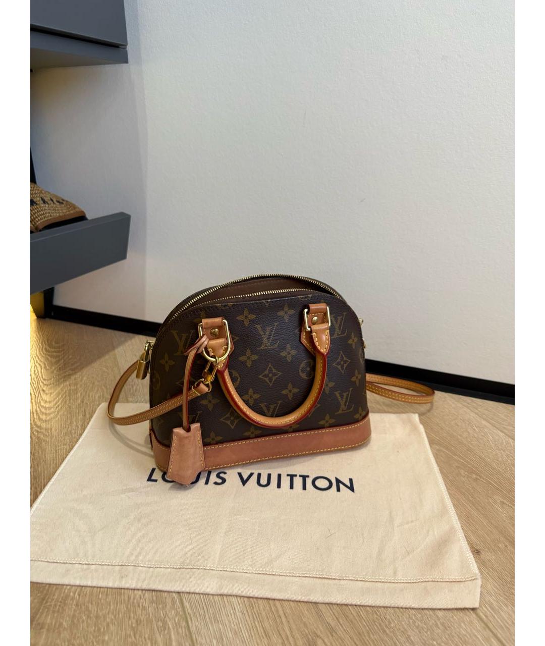 LOUIS VUITTON Коричневая кожаная сумка с короткими ручками, фото 9