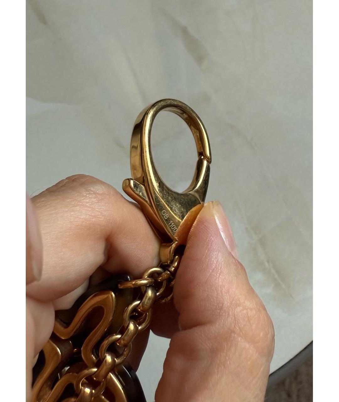 LOUIS VUITTON Коричневый брелок, фото 6