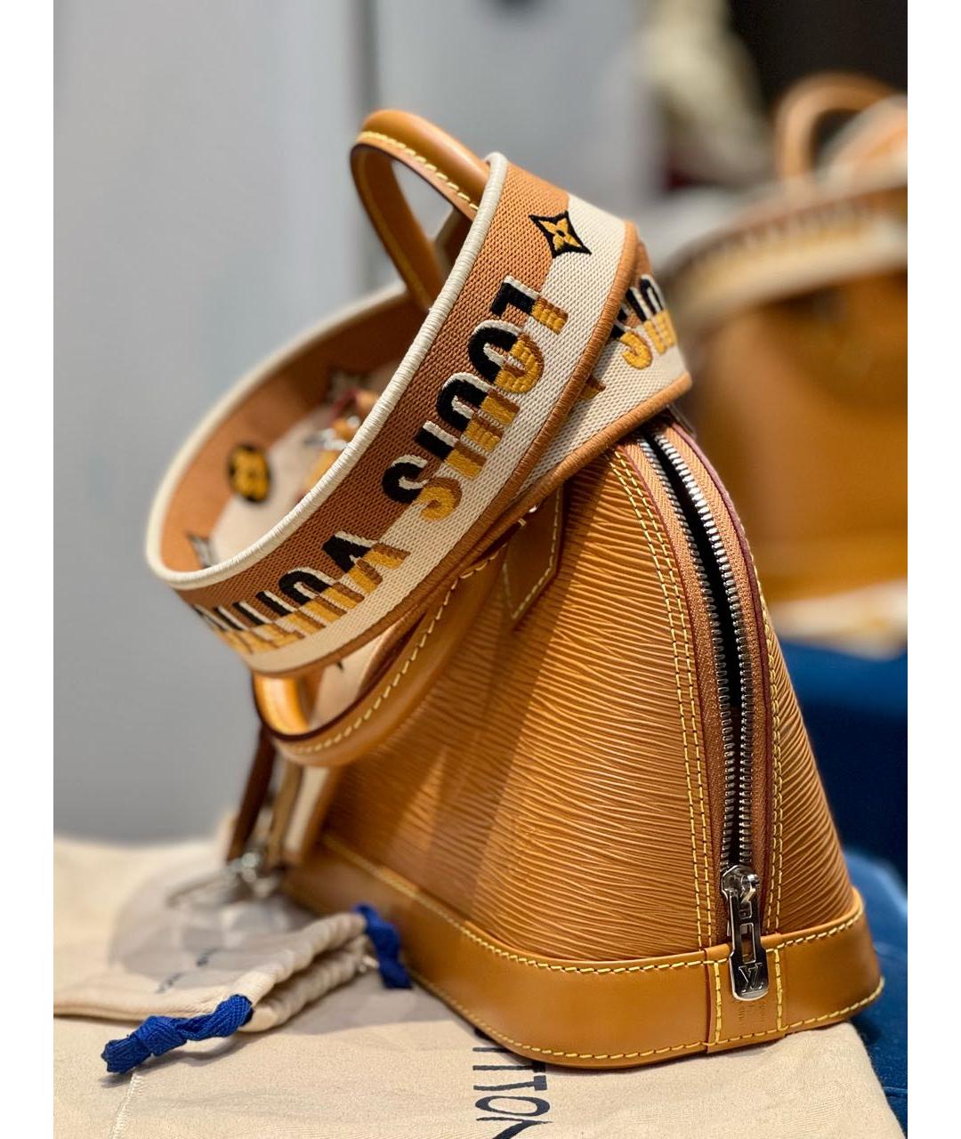 LOUIS VUITTON Горчичная кожаная сумка с короткими ручками, фото 5