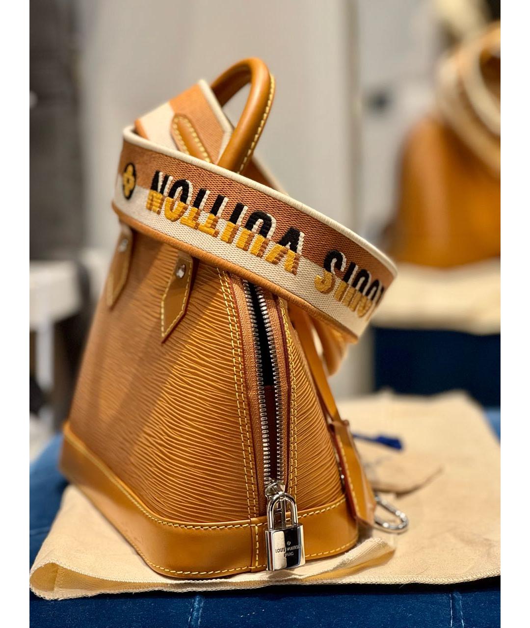 LOUIS VUITTON Горчичная кожаная сумка с короткими ручками, фото 3