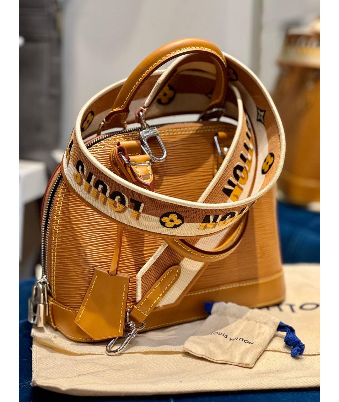 LOUIS VUITTON Горчичная кожаная сумка с короткими ручками, фото 2
