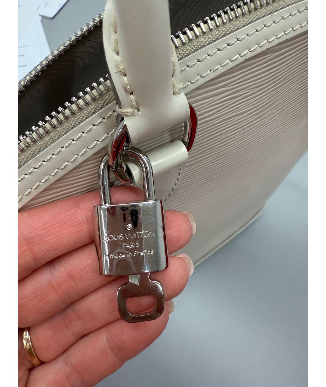 LOUIS VUITTON Бежевая кожаная сумка тоут, фото 5