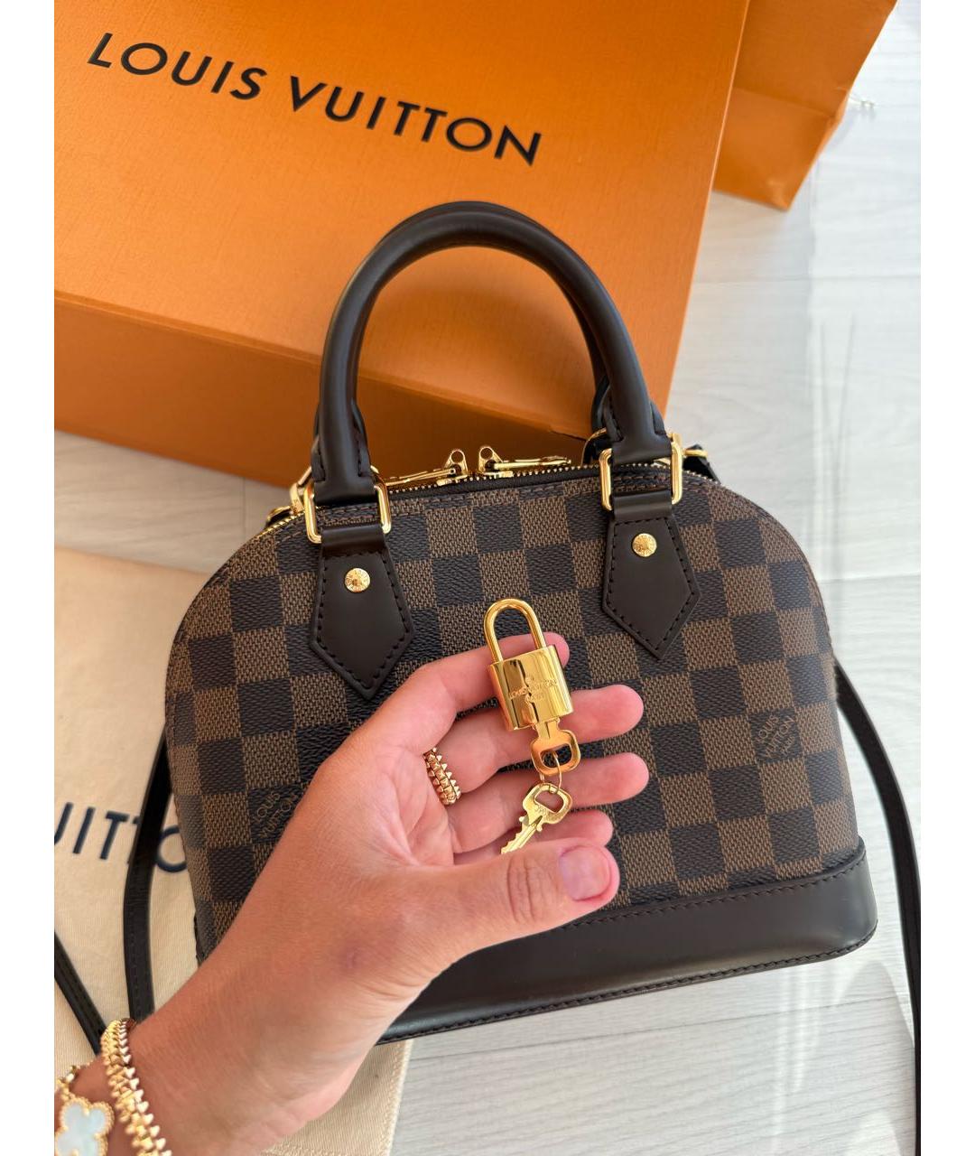 LOUIS VUITTON Коричневая кожаная сумка с короткими ручками, фото 3