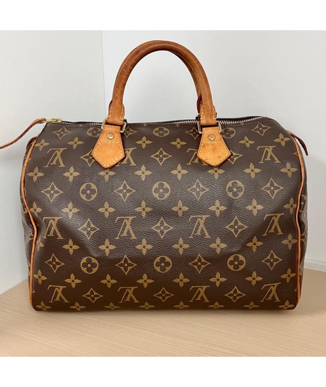 LOUIS VUITTON Коричневая кожаная сумка с короткими ручками, фото 9