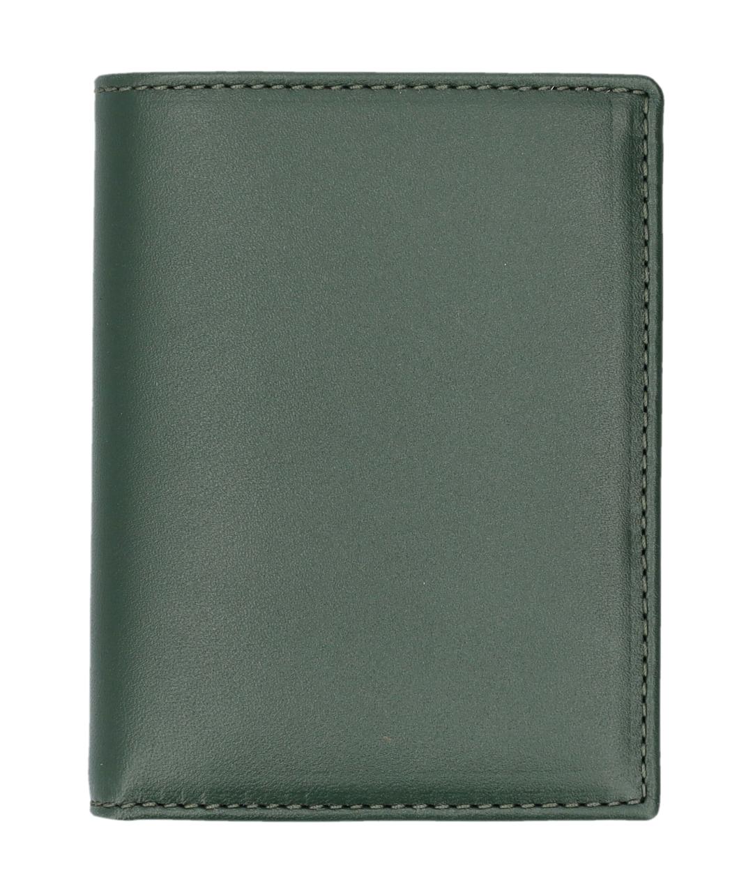 COMME DES GARÇONS WALLET Зеленый кожаный кошелек, фото 1