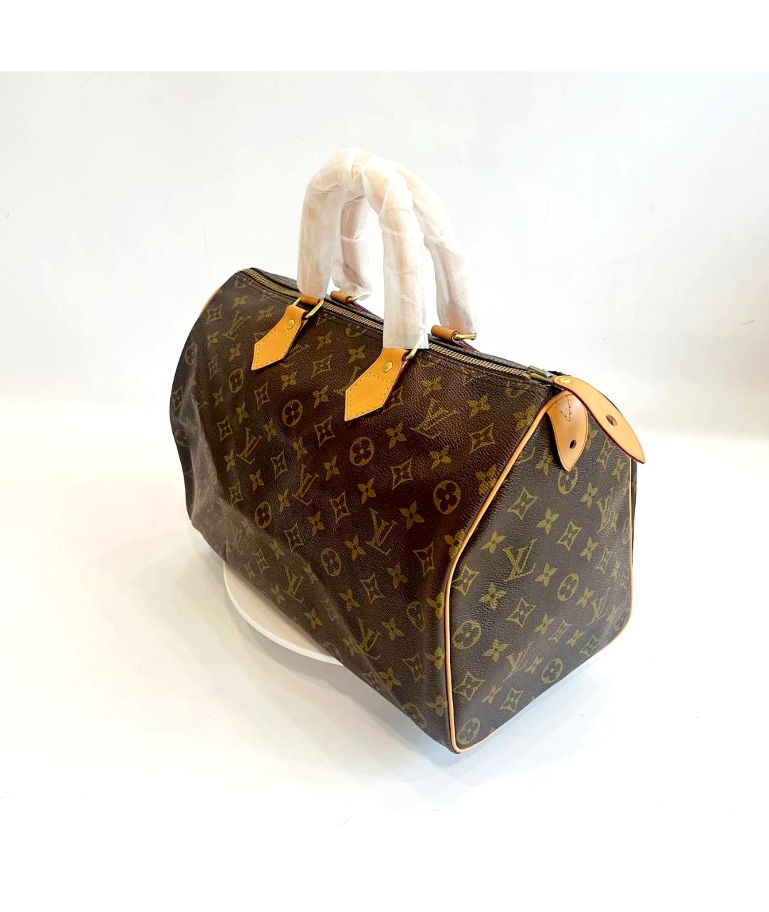 LOUIS VUITTON Коричневая кожаная сумка с короткими ручками, фото 3