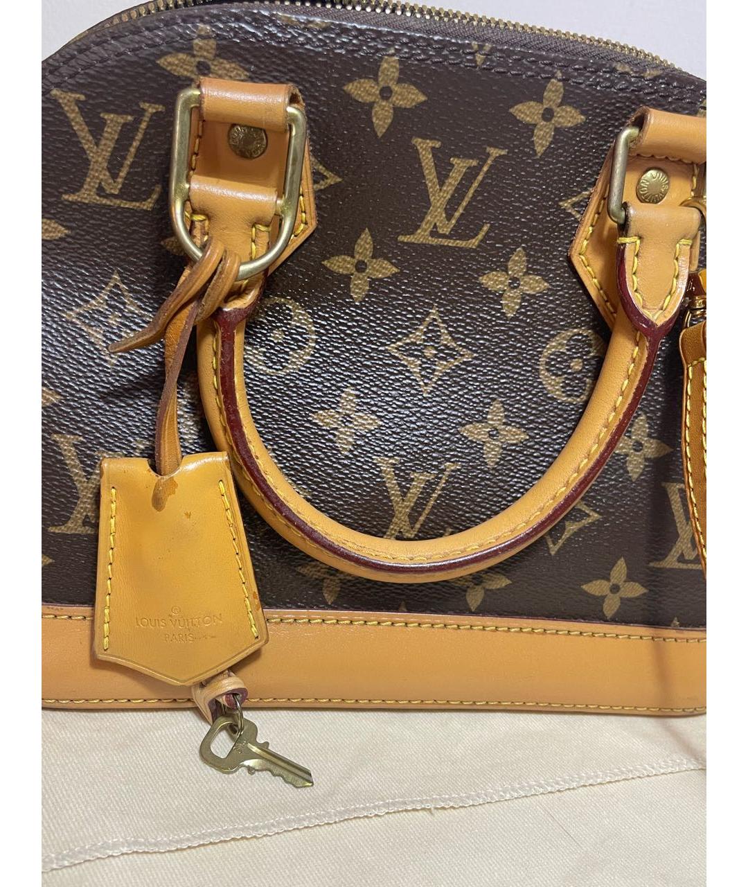 LOUIS VUITTON Коричневая кожаная сумка с короткими ручками, фото 6
