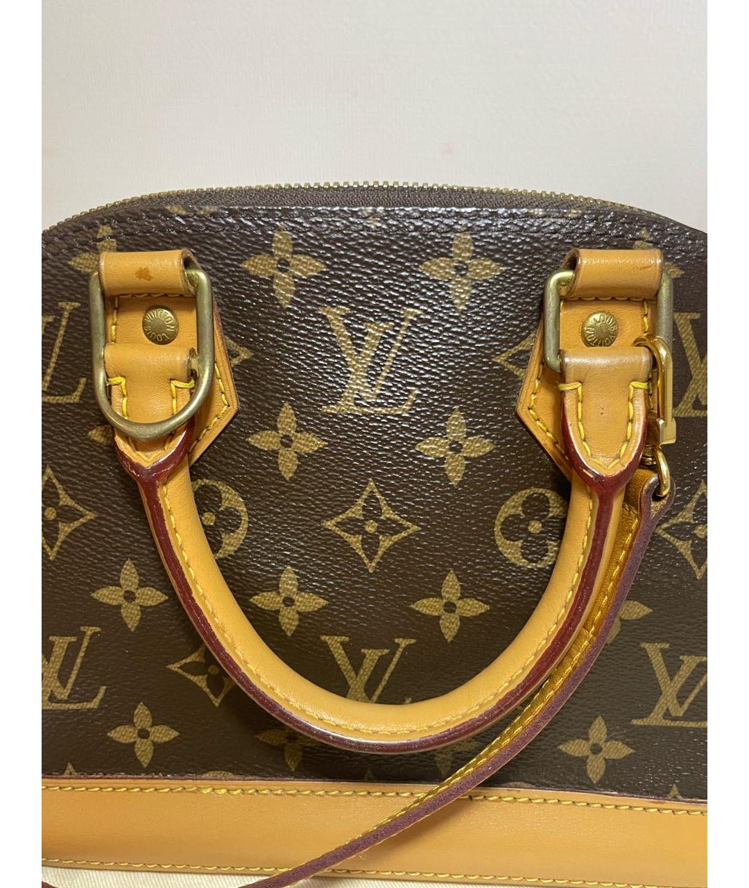 LOUIS VUITTON Коричневая кожаная сумка с короткими ручками, фото 4