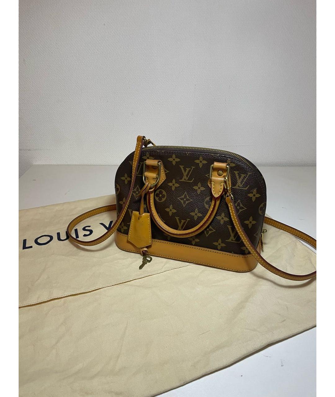 LOUIS VUITTON Коричневая кожаная сумка с короткими ручками, фото 2
