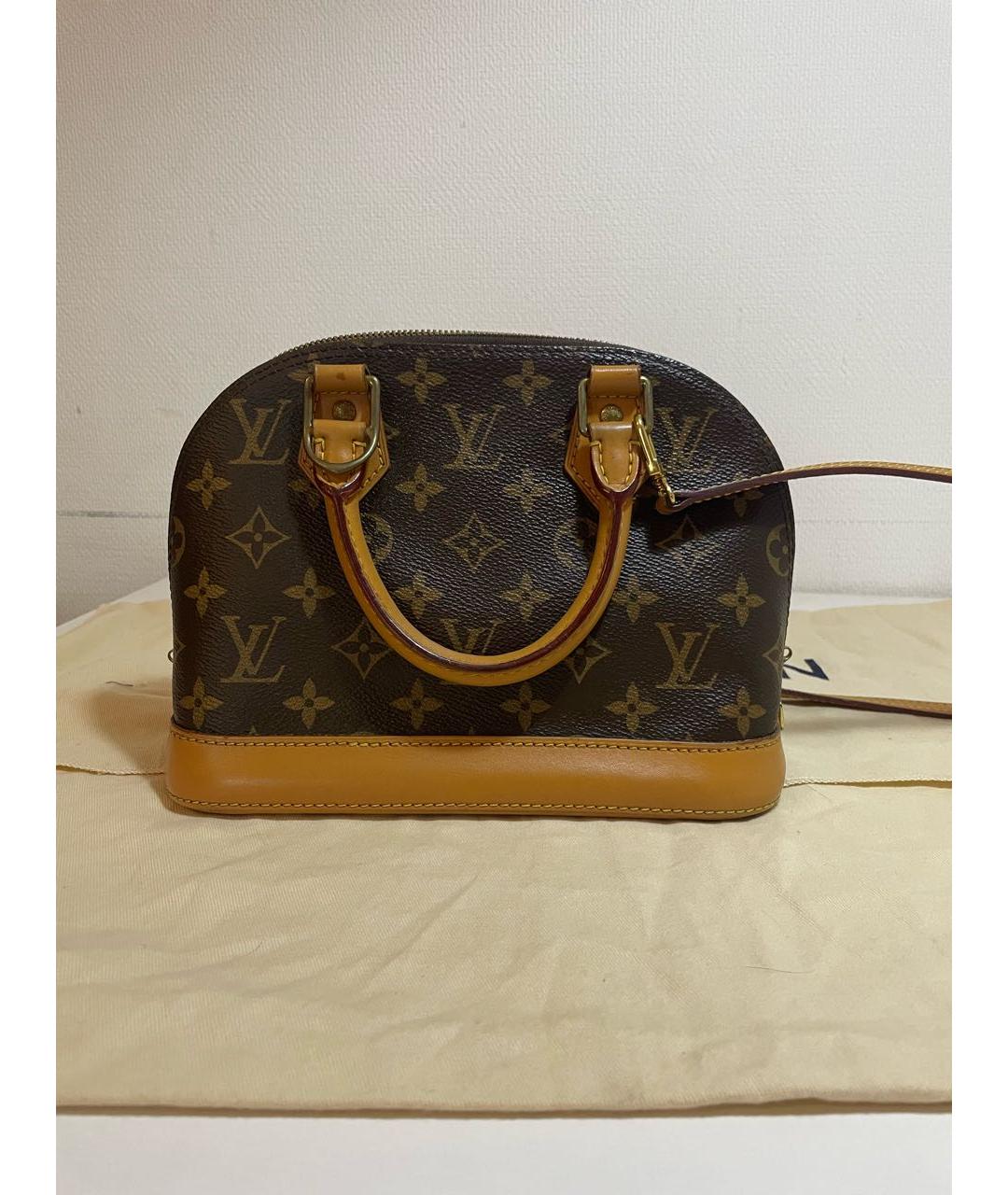 LOUIS VUITTON Коричневая кожаная сумка с короткими ручками, фото 8