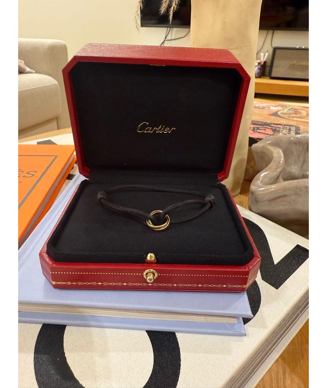 CARTIER Черный браслет из желтого золота, фото 2