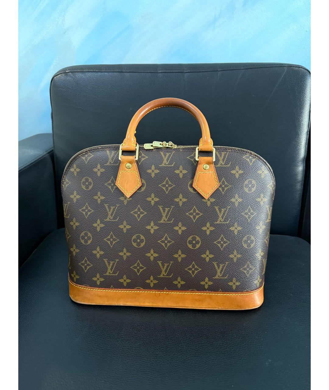 LOUIS VUITTON Коричневая кожаная сумка с короткими ручками, фото 9