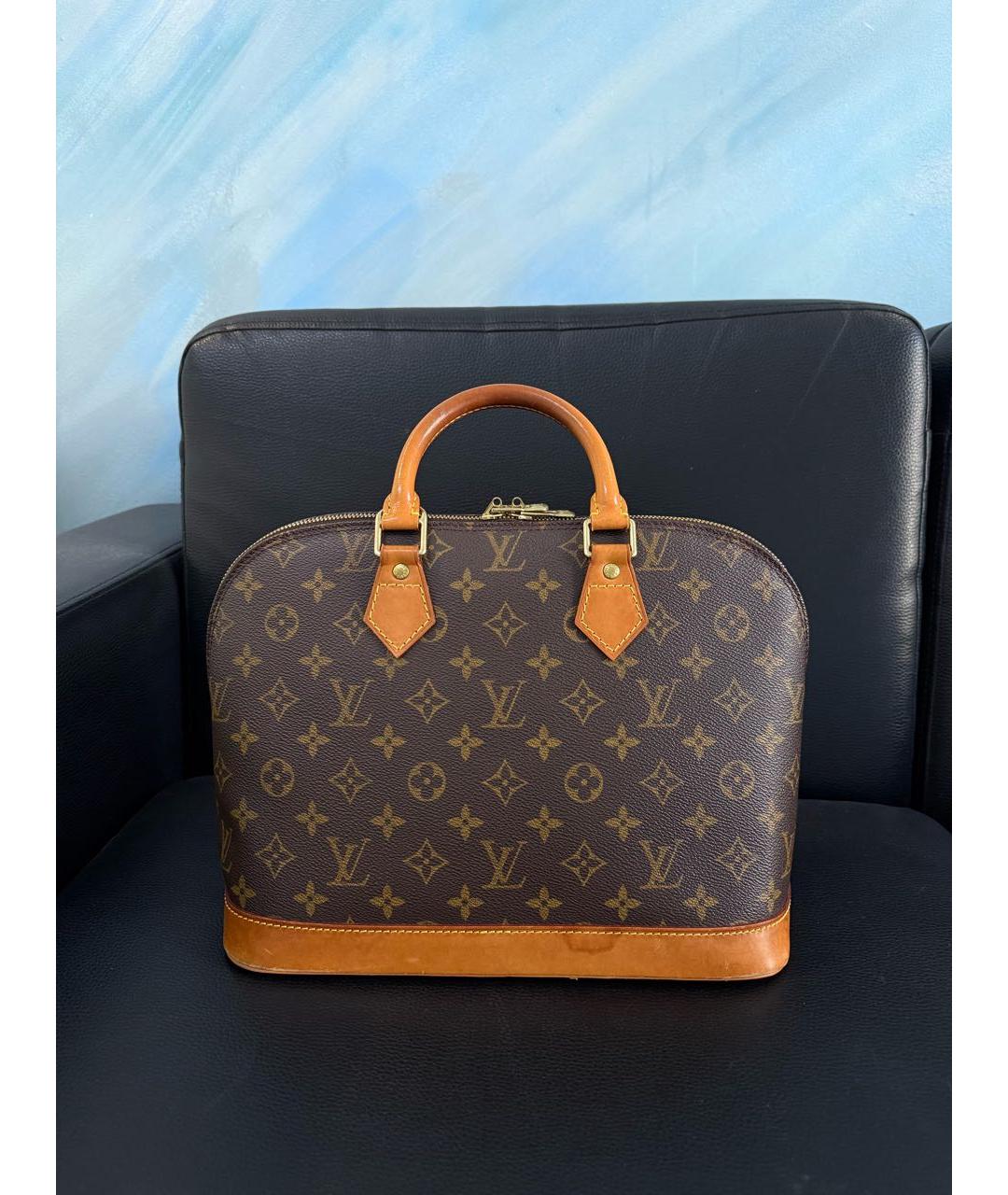 LOUIS VUITTON Коричневая кожаная сумка с короткими ручками, фото 3