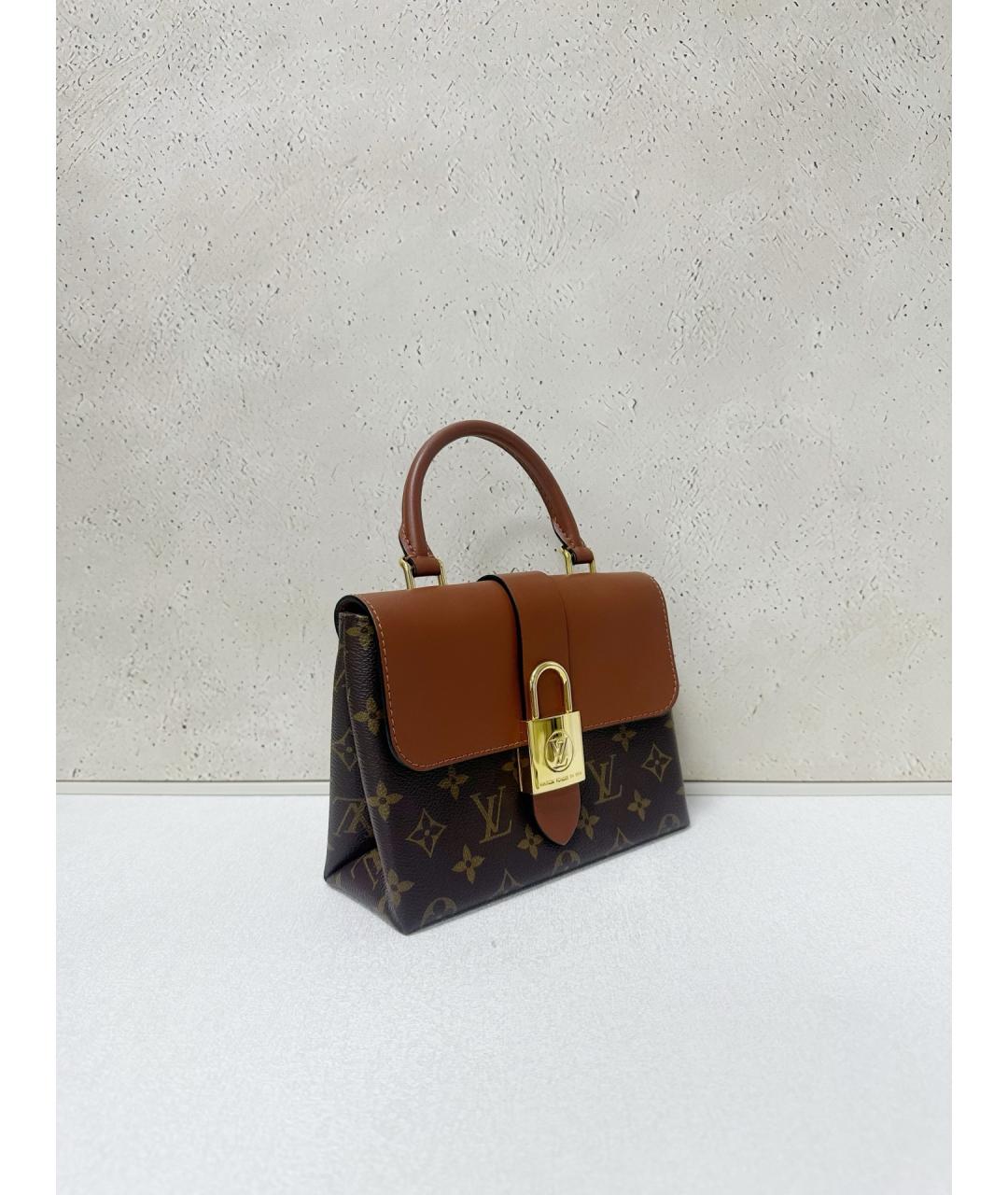 LOUIS VUITTON Коричневая кожаная сумка с короткими ручками, фото 3