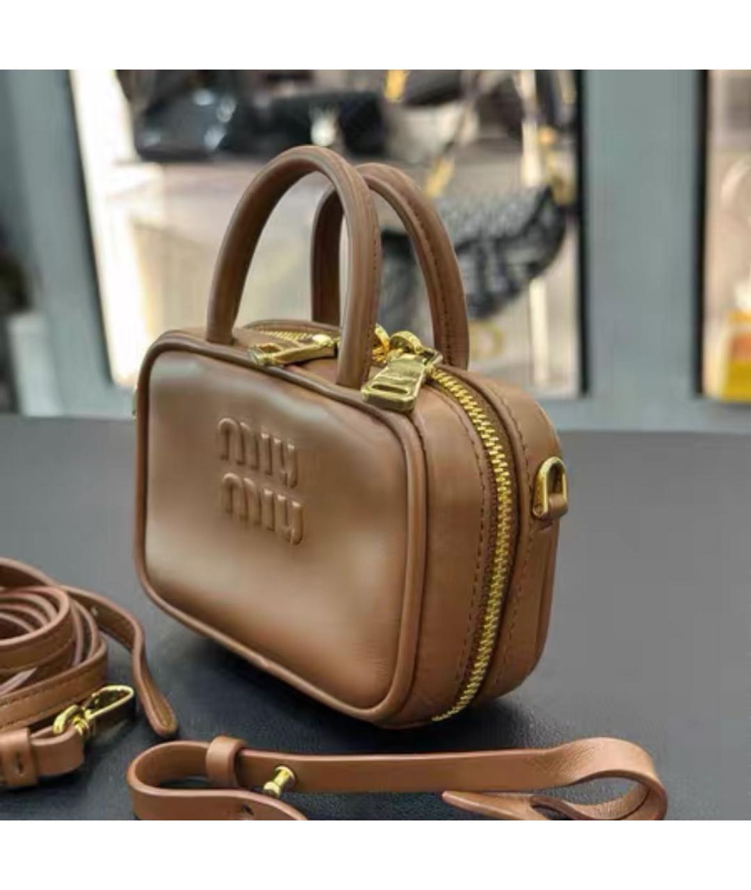 MIU MIU Коричневый брелок, фото 4