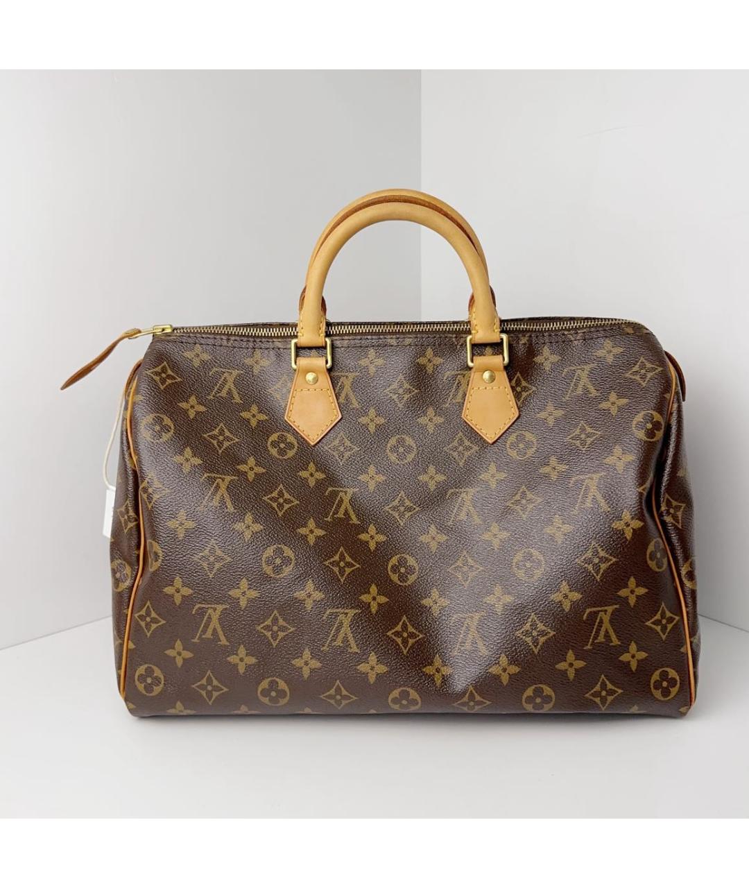 LOUIS VUITTON Коричневая кожаная сумка с короткими ручками, фото 3