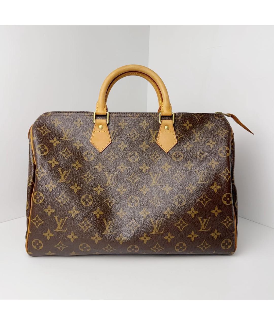 LOUIS VUITTON Коричневая кожаная сумка с короткими ручками, фото 9