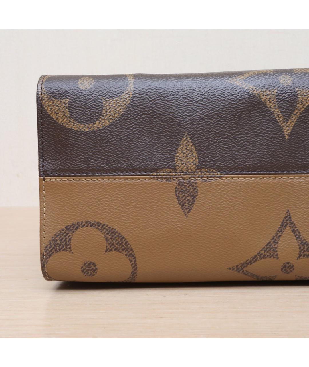 LOUIS VUITTON Коричневая кожаная сумка тоут, фото 9