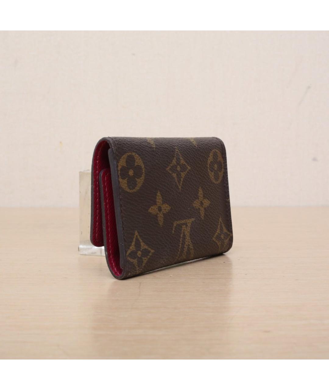 LOUIS VUITTON Коричневая ключница, фото 6