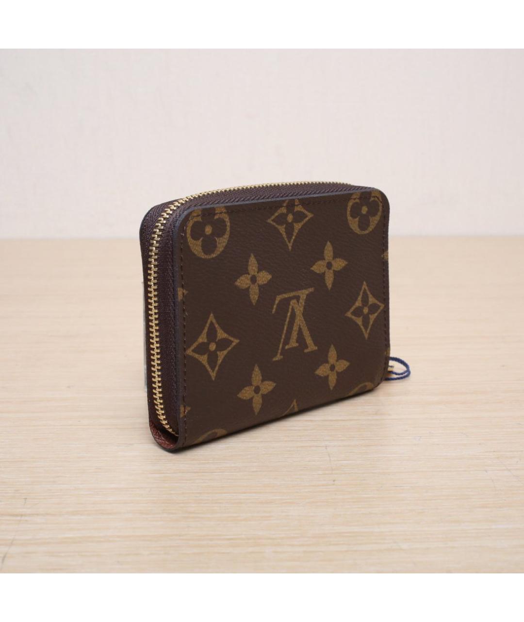 LOUIS VUITTON Коричневый кожаный кошелек, фото 6