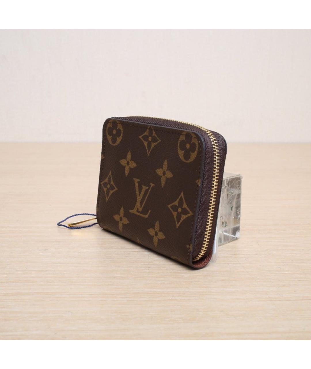 LOUIS VUITTON Коричневый кожаный кошелек, фото 4