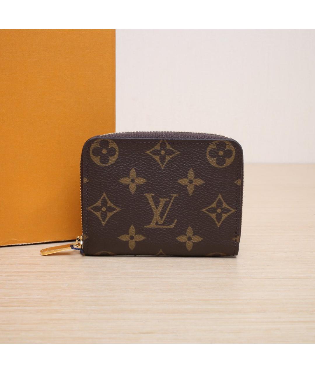 LOUIS VUITTON Коричневый кожаный кошелек, фото 2