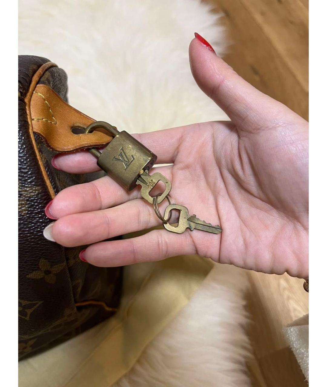 LOUIS VUITTON Коричневая кожаная сумка с короткими ручками, фото 6