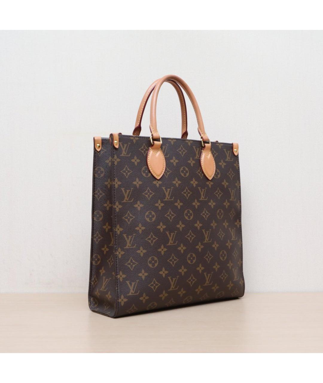 LOUIS VUITTON Коричневая кожаная сумка через плечо, фото 6