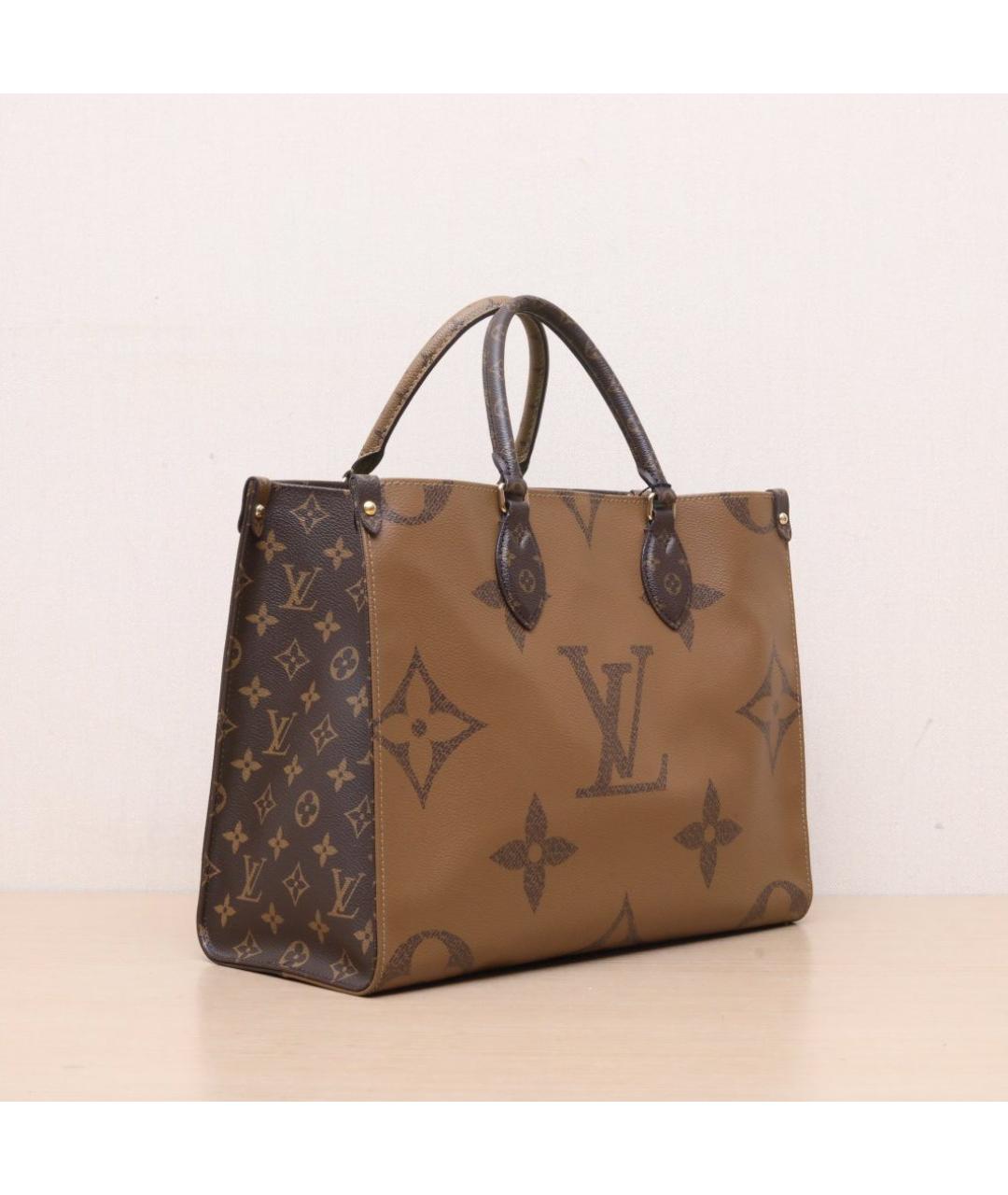 LOUIS VUITTON Коричневая кожаная сумка тоут, фото 6