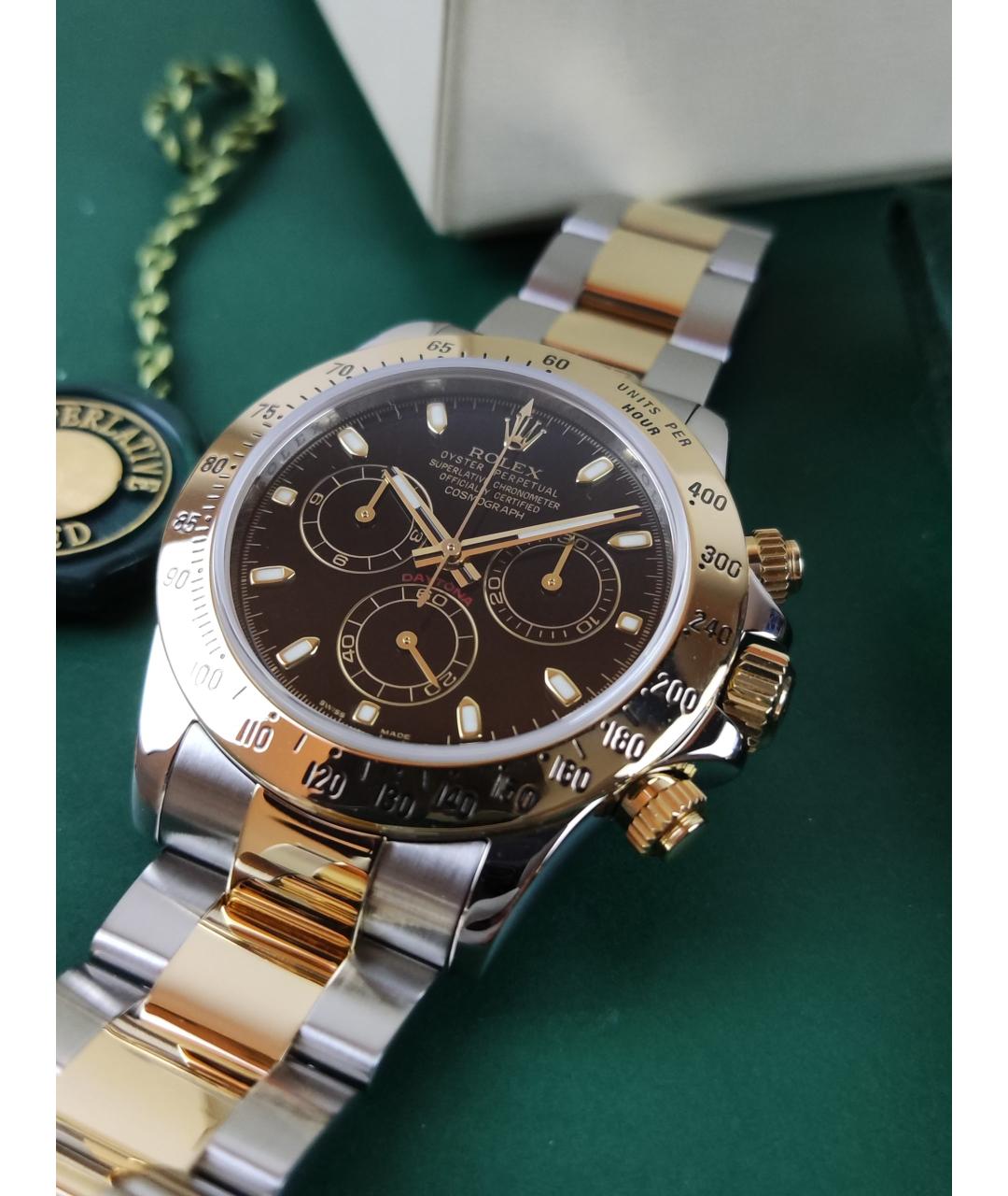 ROLEX Черные часы из желтого золота, фото 2