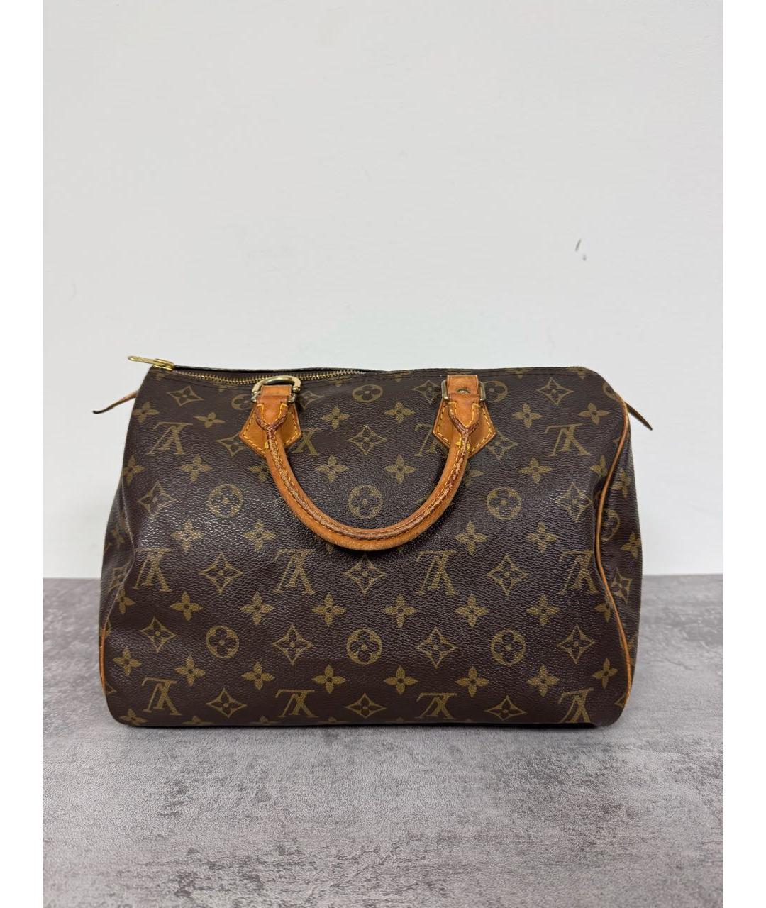 LOUIS VUITTON Коричневая кожаная сумка с короткими ручками, фото 9